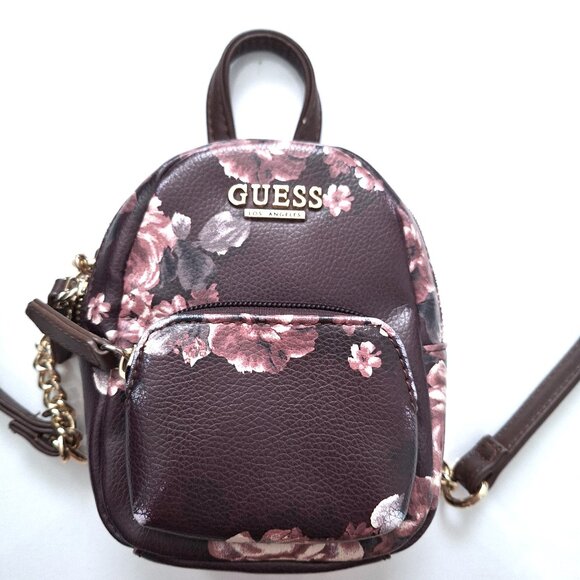 Guess Evan Aubergine Colour Floral Mini Backpack Crossbody Bag - Picture 1 of 11